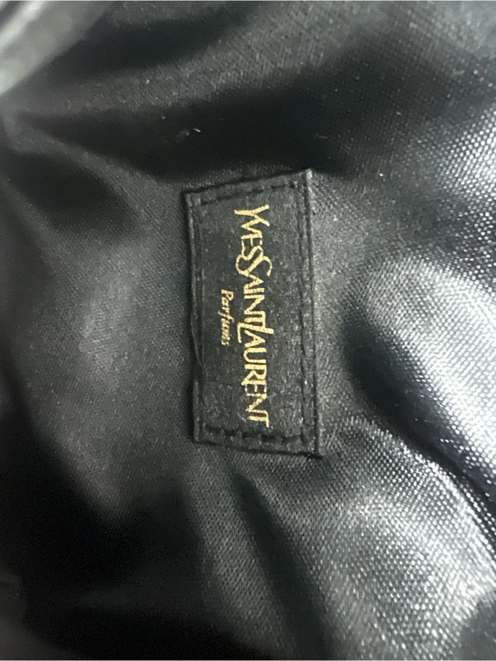 YSL beauty Black glossy pouch.
